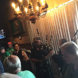 The bag pipers and drummer cane in for a while