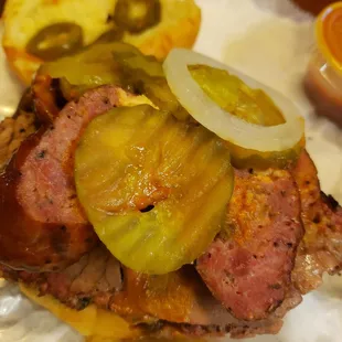 The brisket and sausage sandwich is LOADED.
