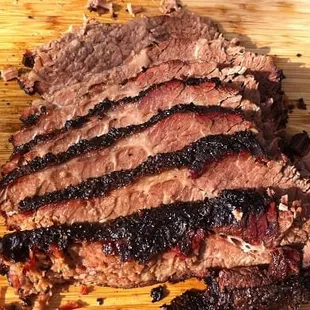 sliced beef on a cutting board