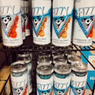 a shelf full of cans