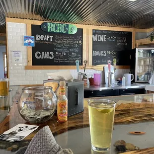 a glass of beer on the bar