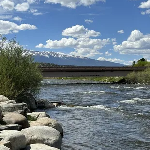 a covered bridge in the distance