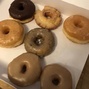 a dozen donuts in a box