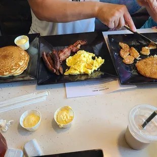 Pancakes, eggs and bacon.