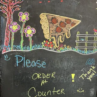 a chalk drawing of a wheelbarrow