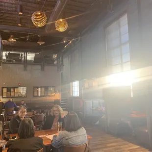 a group of people sitting at a table