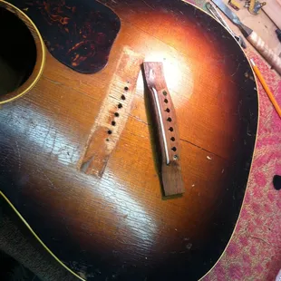 Replacing the bridge on a LG-1 Gibson from the 1940's