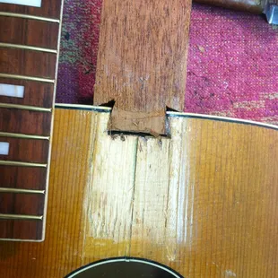 no truss rod in this old Kay guitar... so I pulled the fingerboard off and routed a channel and installed one!