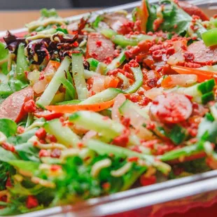 a salad in a plastic container