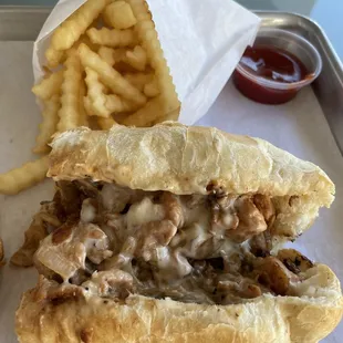 Chicken philly supreme without bell peppers and amazing French fries.