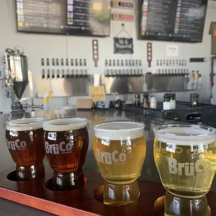 A flight of Helles Dorado, Arizona Gold, Weapons Check, Epicenter amber ale
