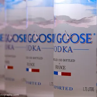 a row of bottles of vodka
