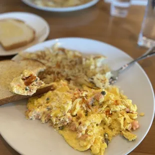 Scrambled eggs with salmon and capers.. I think it is called salmon scrambler.. I didn't find the name on there online menu