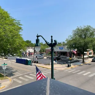 a view of a street from a balcony