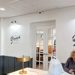 a woman sitting at a table