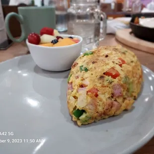 An outstanding Denver Omelette, fruit on the side.