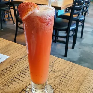 Strawberry, orange and clud soda mocktail.