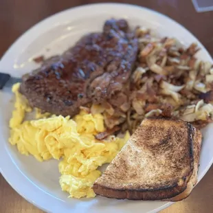 Ribeye steak and eggs with sourdough toast
