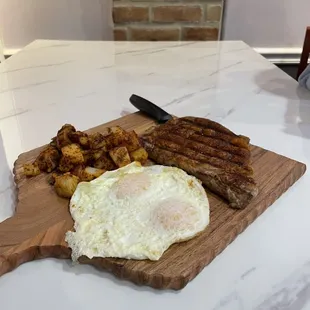 ribeye with your choice of eggs and our special red potatoes