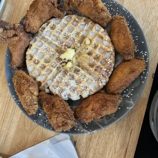 a plate of fried chicken and waffles