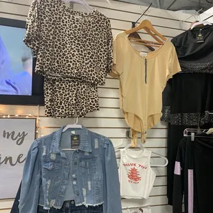 a variety of clothing on display
