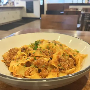 Egg noodles pappardelle with sausage ragu'