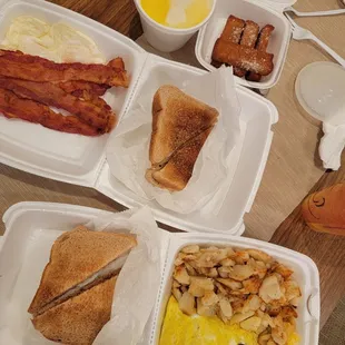 Western omelet, breakfast platter with grits, French toast sticks