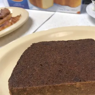 a piece of chocolate cake on a plate