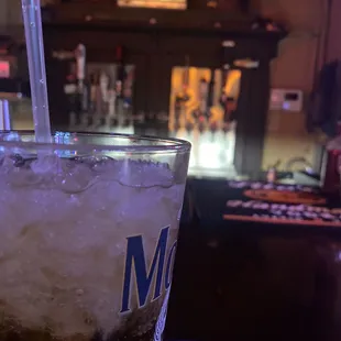 a cold drink in a glass