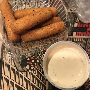 mozzarella sticks with crumb coating, not very good, and interestint dill sauce