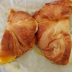In house made crossiants that melt in your mouth  egg cheese breakfast sandwich