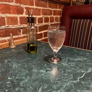 a glass of water on a table