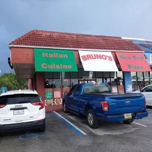 two cars parked in a parking lot