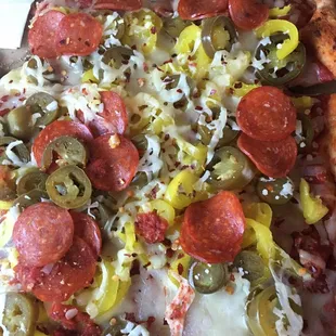 a pepperoni and peppers pizza