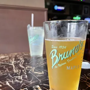 a glass of beer on a table