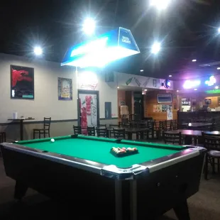 Pool table in bar area, darts and jukebox.