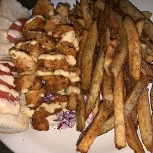 Shrimp Po Boy with crab French fries (3.5 out of 5) the bread was over grilled