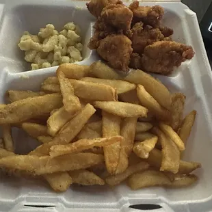 To go order of chicken bite dinner fries and Mac and cheese