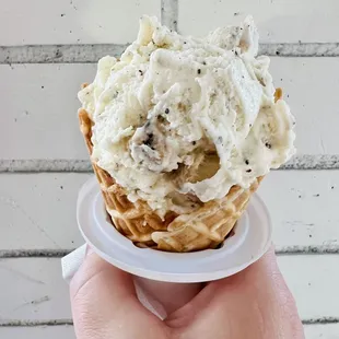 Chocolate chip cookie dough on a waffle cone