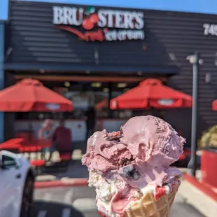 Black cherry on top of mixed berry cheesecake