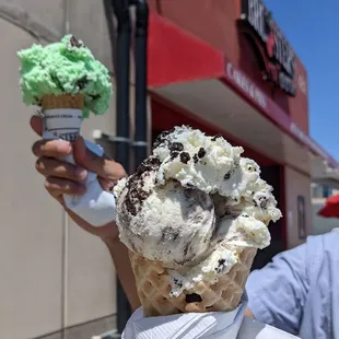 Mint chocolate chip on sugar cone and Oreo on waffle cone
