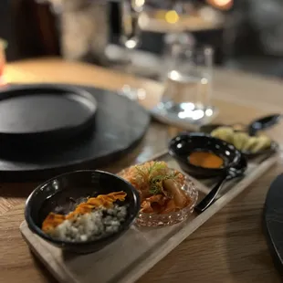 a plate of food on a wooden table