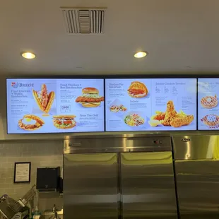 a menu on the wall of a restaurant