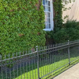 a fence surrounding a building