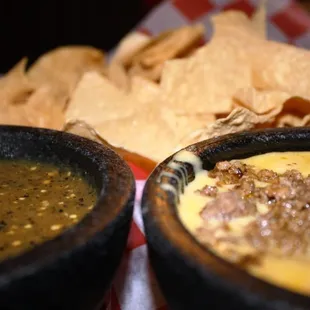 two bowls of soup and tortilla