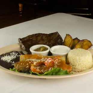 Our Combinación Chapina (Guatemalan Combination) It includes a Grilled ribeye steak, chile relleno your choice (pork, cheese, chicken or ch