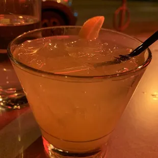 a drink with a spoon in it