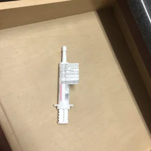 Canine shot found in kitchen drawer. Completely unused and collecting dust, evidence no care was given in prior cleanup.