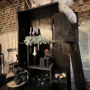 a ladder leaning against a brick wall