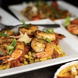 a plate of shrimp and pasta